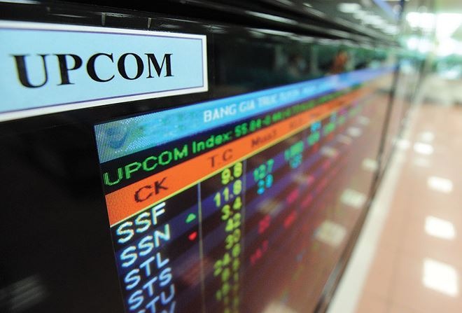 Màn hình hiển thị chỉ số và giá cổ phiếu trên sàn UPCOM, với thông tin chi tiết về mã cổ phiếu và giá trị.