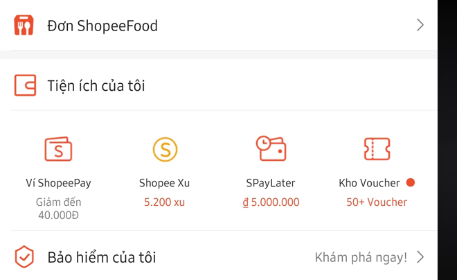 Giao diện ứng dụng Shopee hiển thị các tiện ích: ShopeePay, Shopee Xu, SPayLater, và Kho Voucher.
